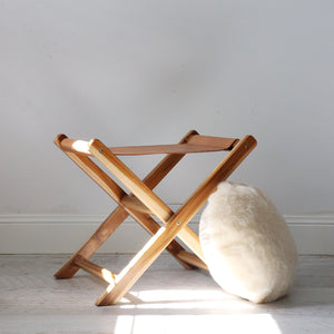 sheepskin cushion and folding leather stool
